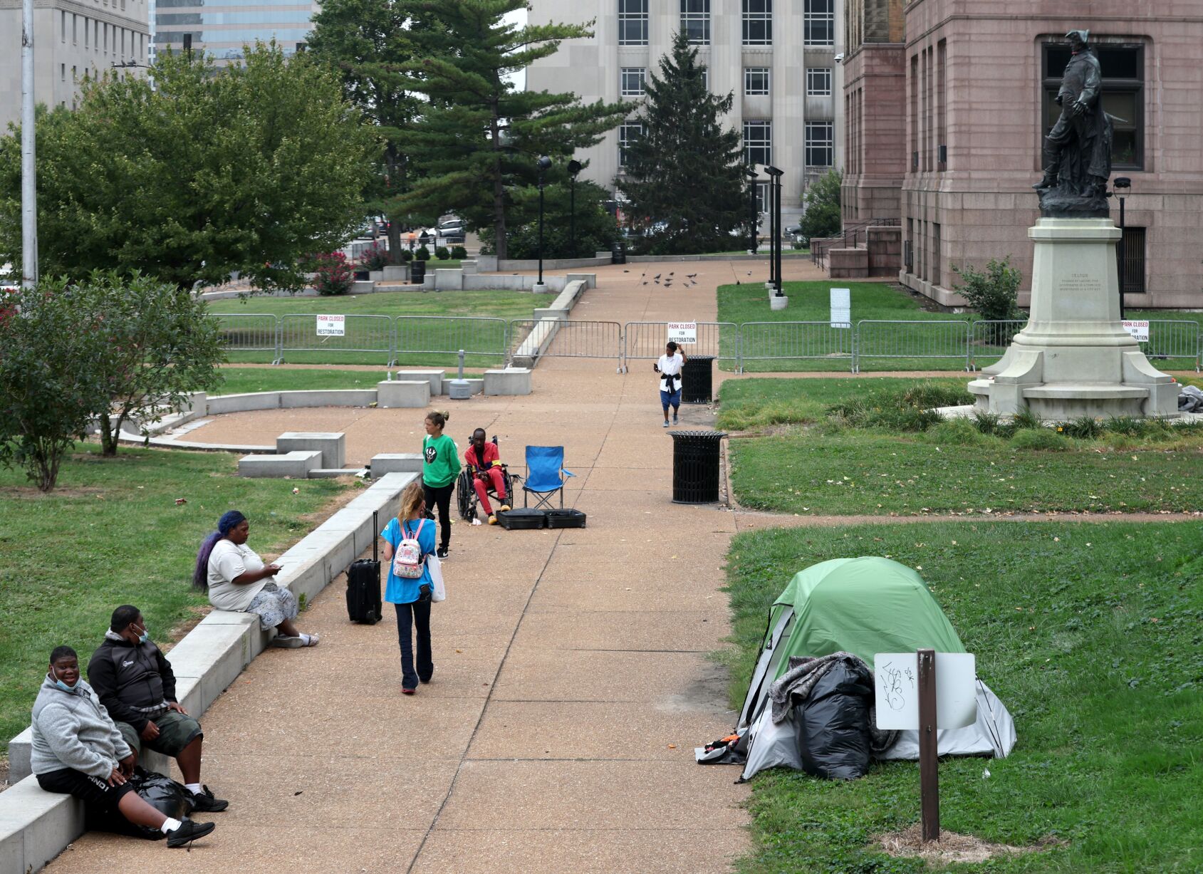 Some from homeless camp at City Hall remain downtown